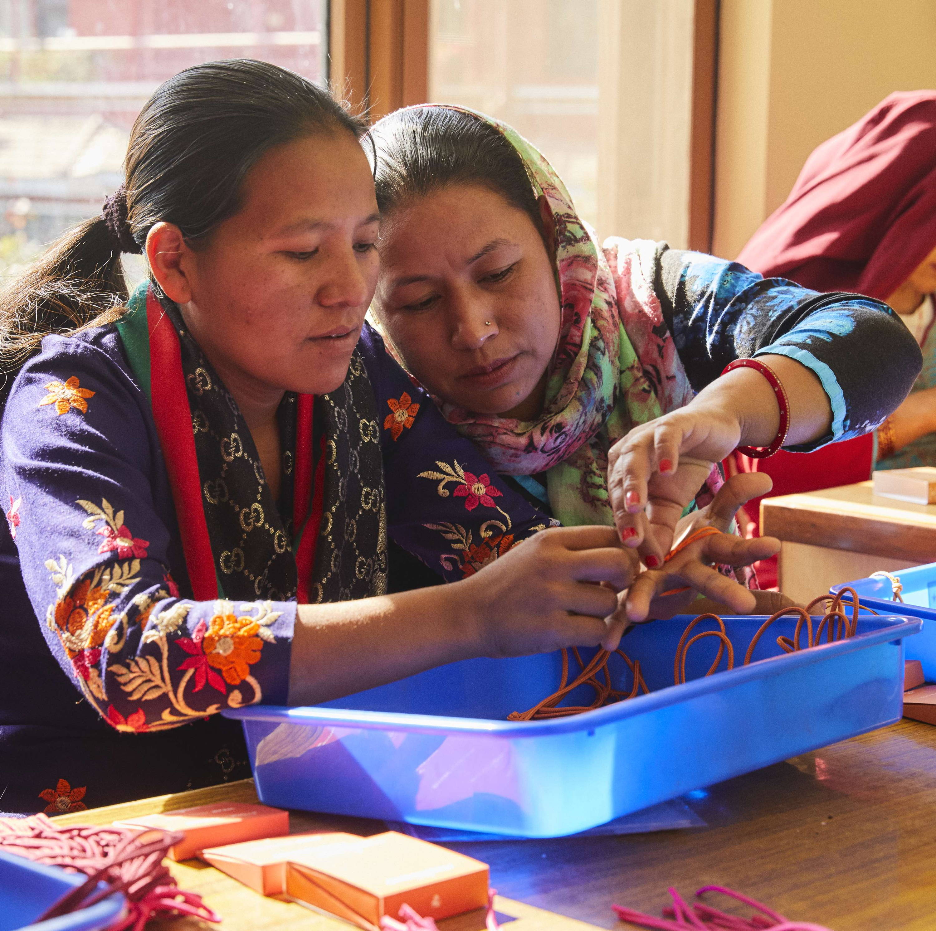 Dhan Maya Tamang and Urmila Rai making #TOGETHERBANDs