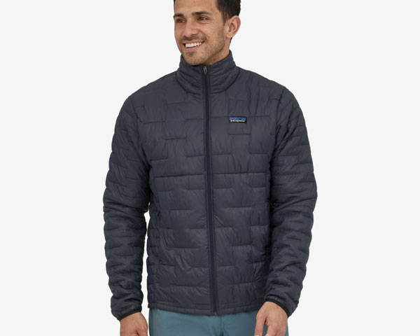 Man wearing black recycled insulated jacket from sustainable outdoor brand Patagonia
