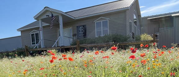 Bentley Seed Building with Pollinator Flower Garden