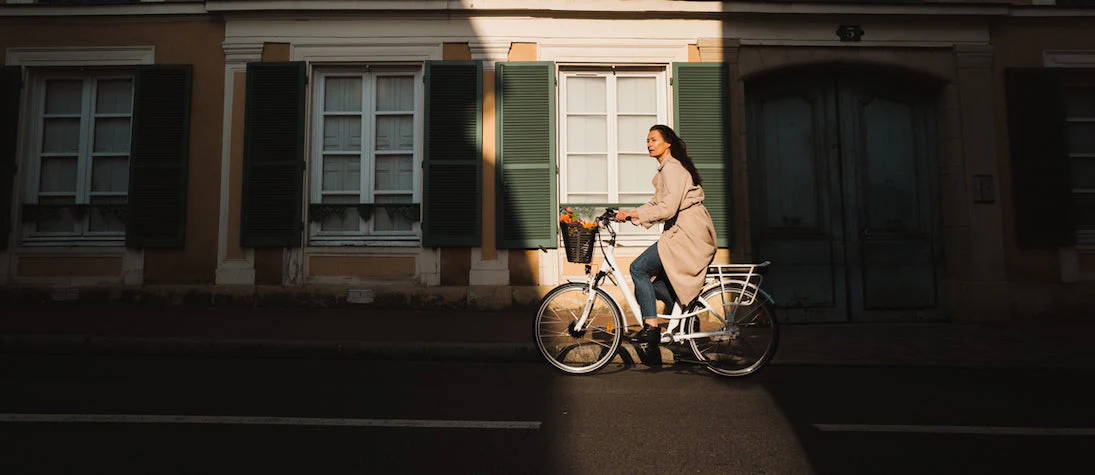 Cycling on one of the 10 best electric bikes for women.