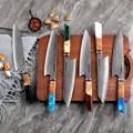 A vibrant collection of the Kiritsuke 6-piece knife set on a cutting board, perfect for a stylish and efficient kitchen.
