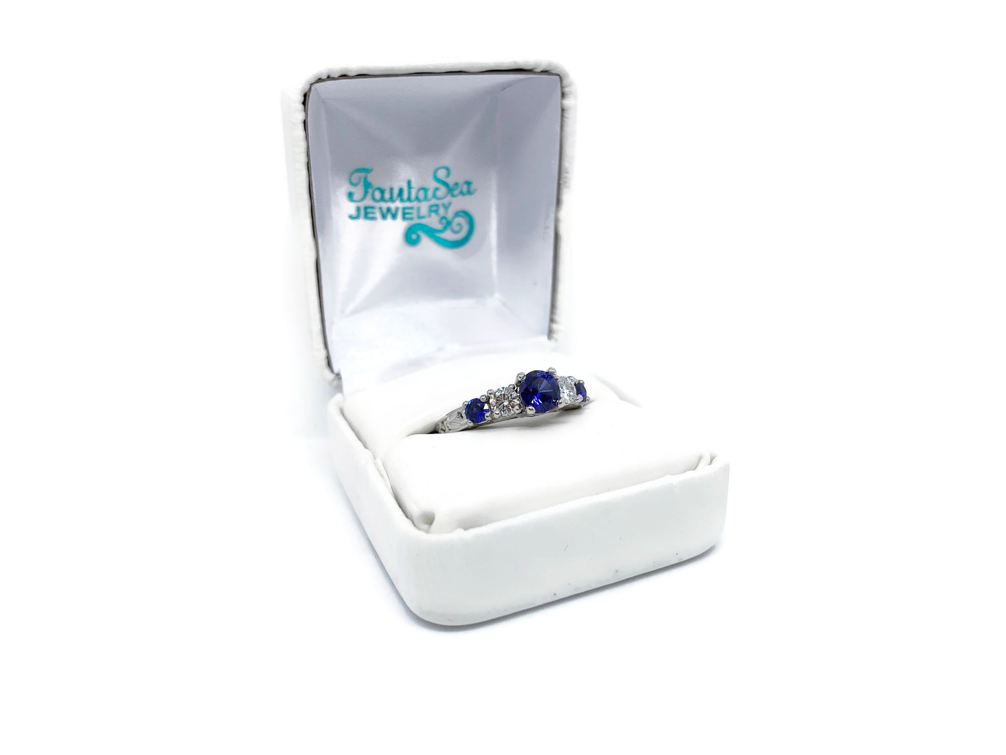 Platinum Engagement Ring with Blue Sapphire