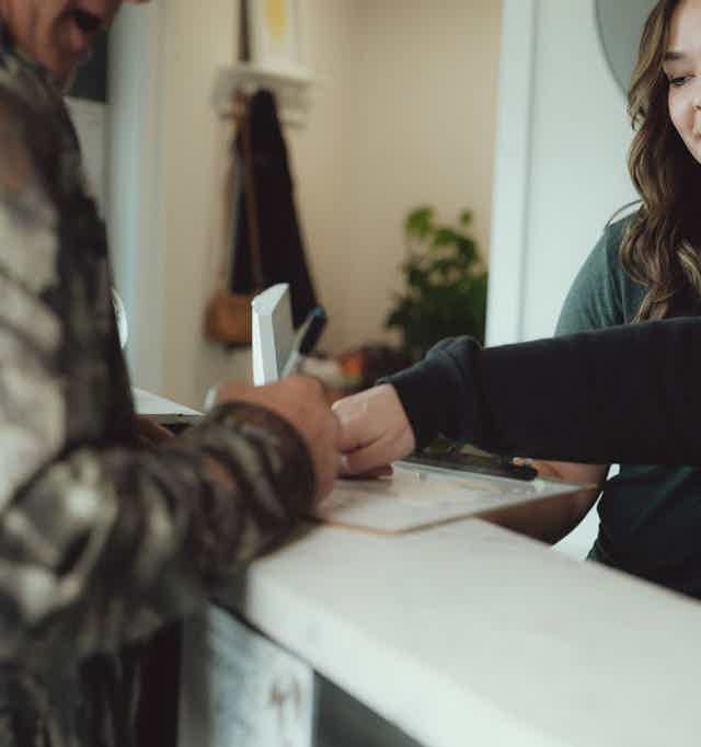Wellness team smiling in clinic