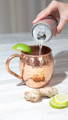 Pouring Ferm Fatale Moscow Mule