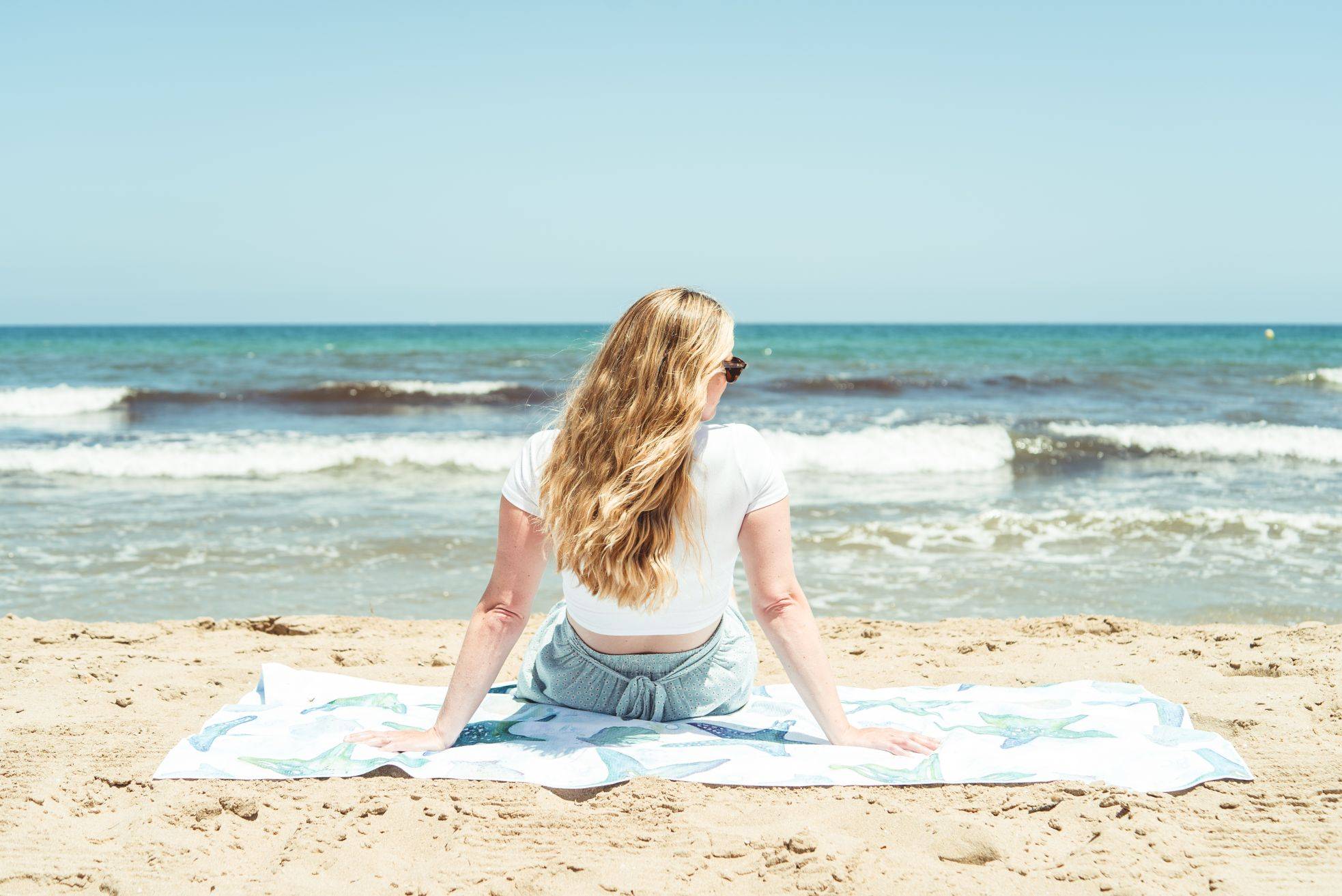 Image of women with wavy hair on beach