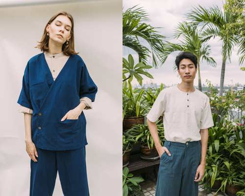 Woman wearing indigo jinbei-style coat with matching trousers and beige collarless shirt and man wearing a collarless short sleeve henley with indigo cotton trousers from sustainable fashion brand Seeker x Retriever