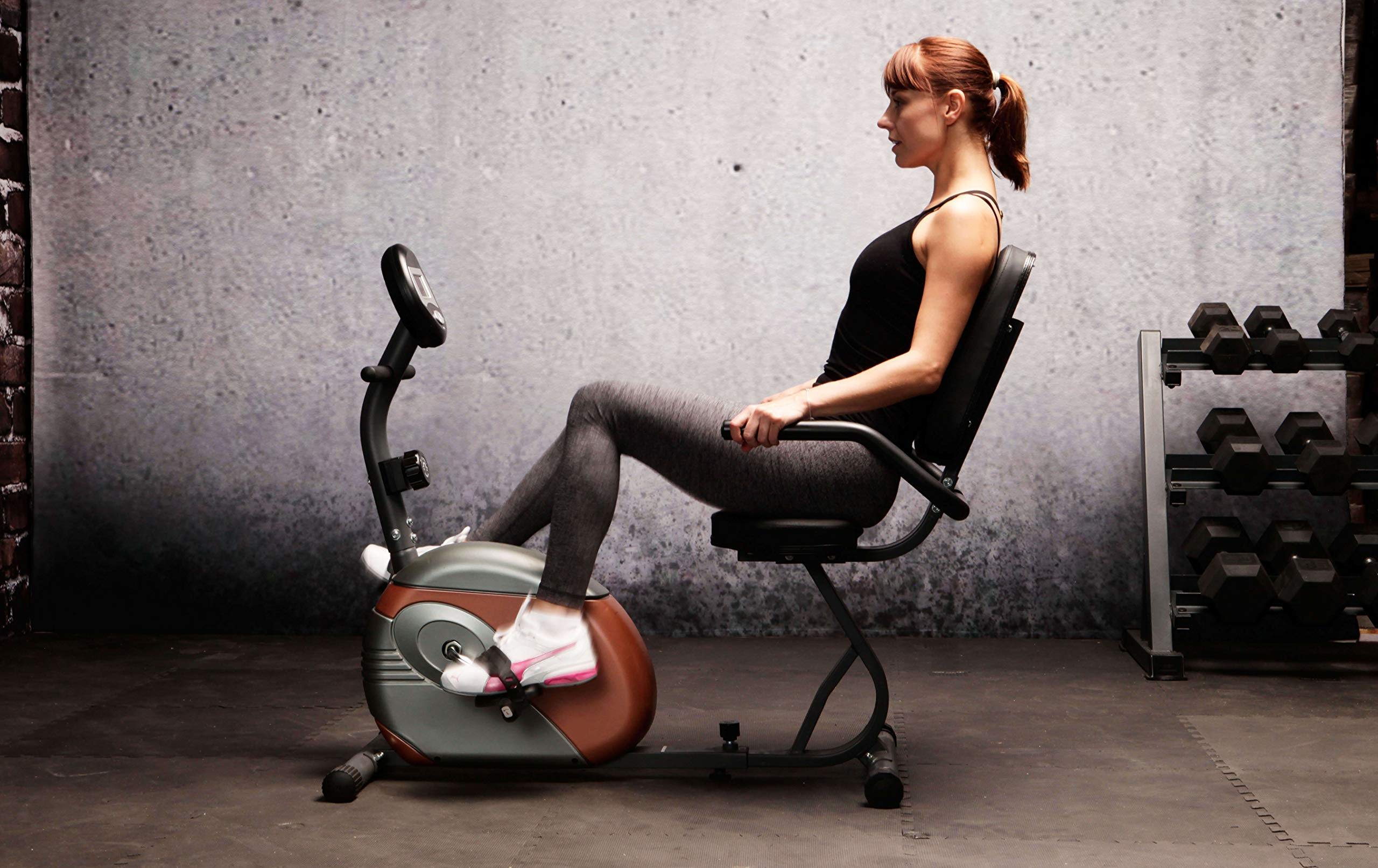 Riding Exercise Bike by Women
