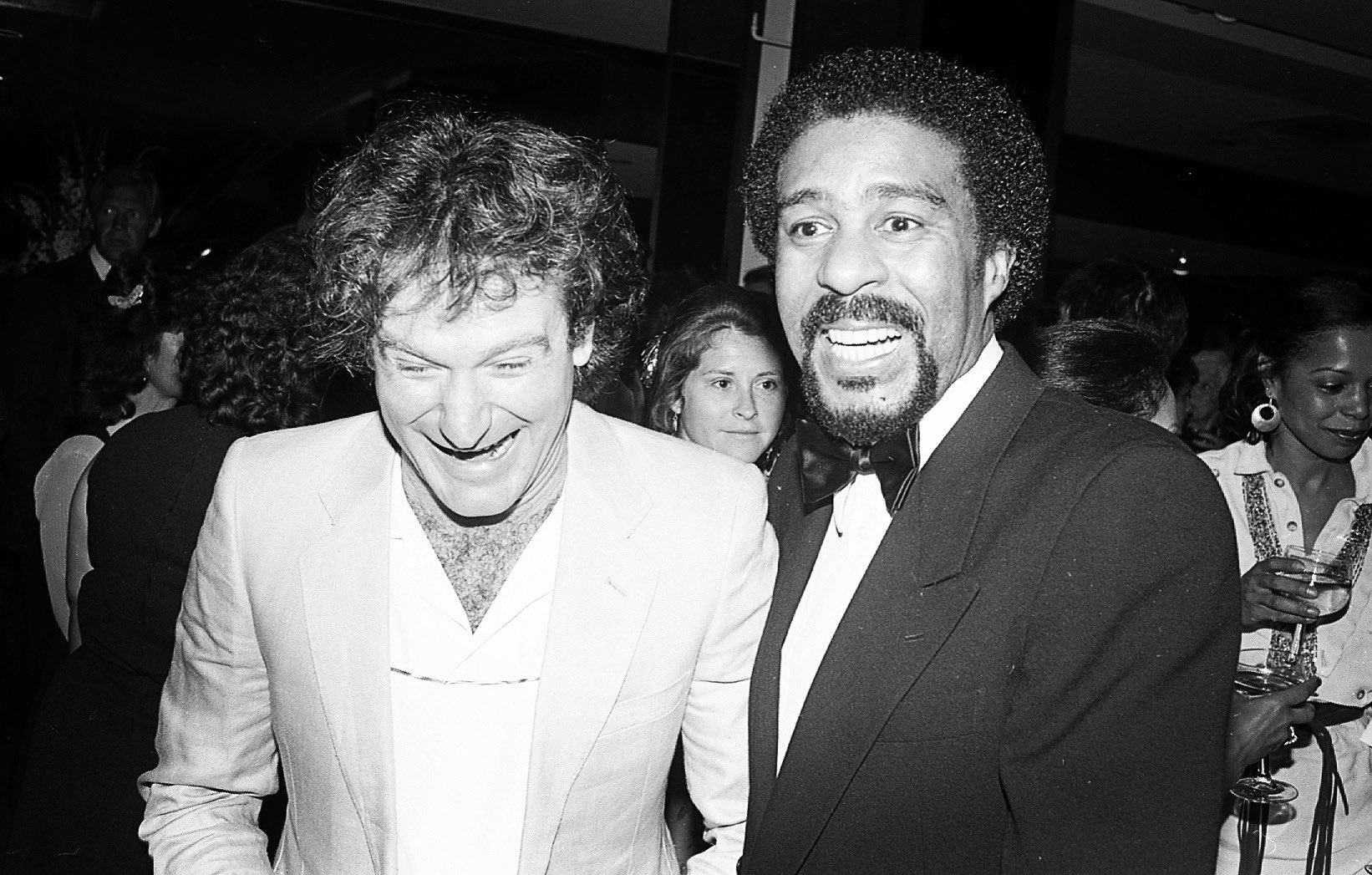 Black and white photograph of Robin Williams and Richard Pryor.