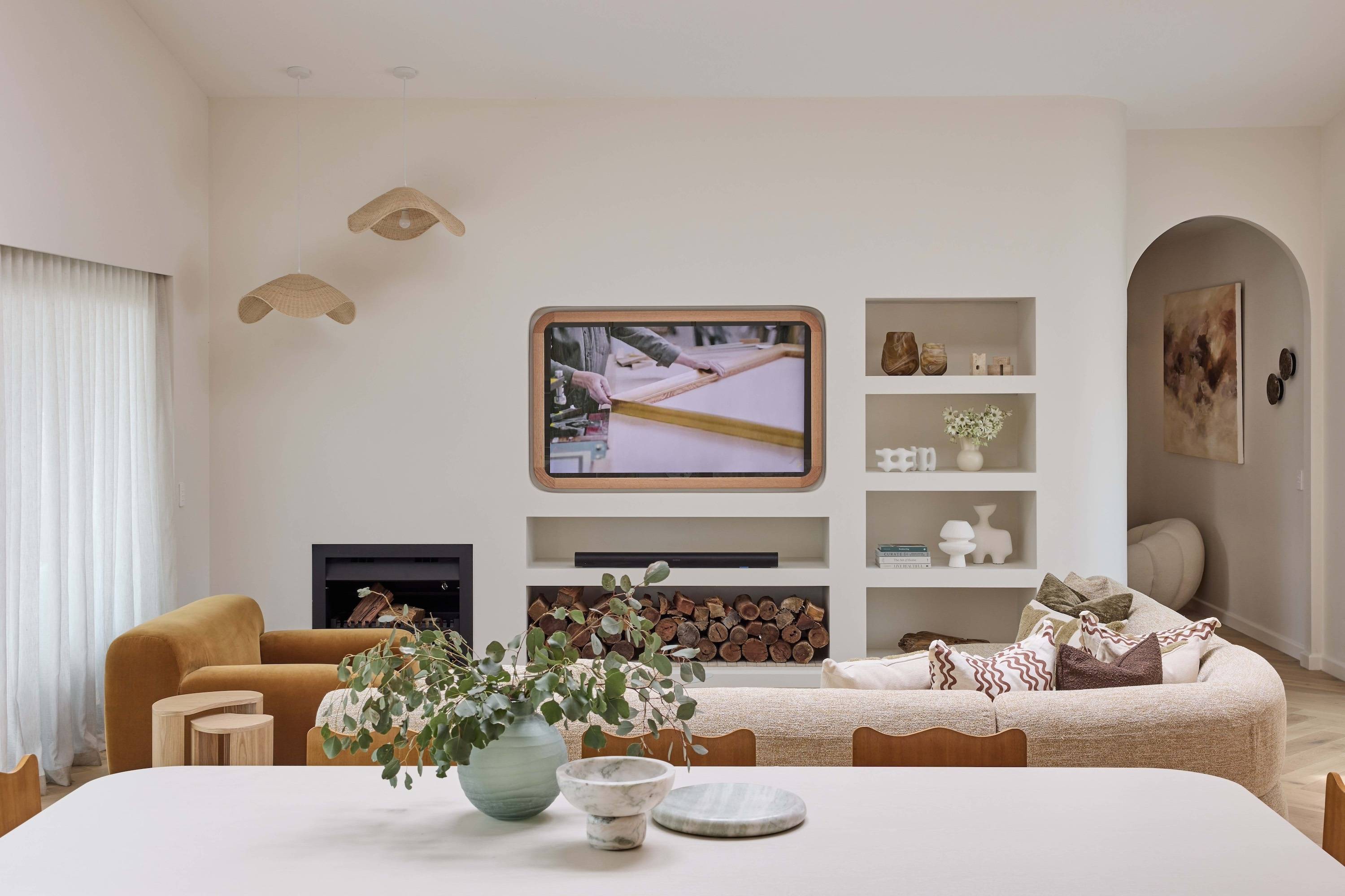Contemporary Curve TV-Mirror by FRAMING TO A T - As seen on The Block in Courtney and Grant's Living and Dining Room, this Danish-inspired light oak timber framed TV Mirror features contemporary curved corners.