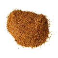 Ground sazon spice mixture on a white background