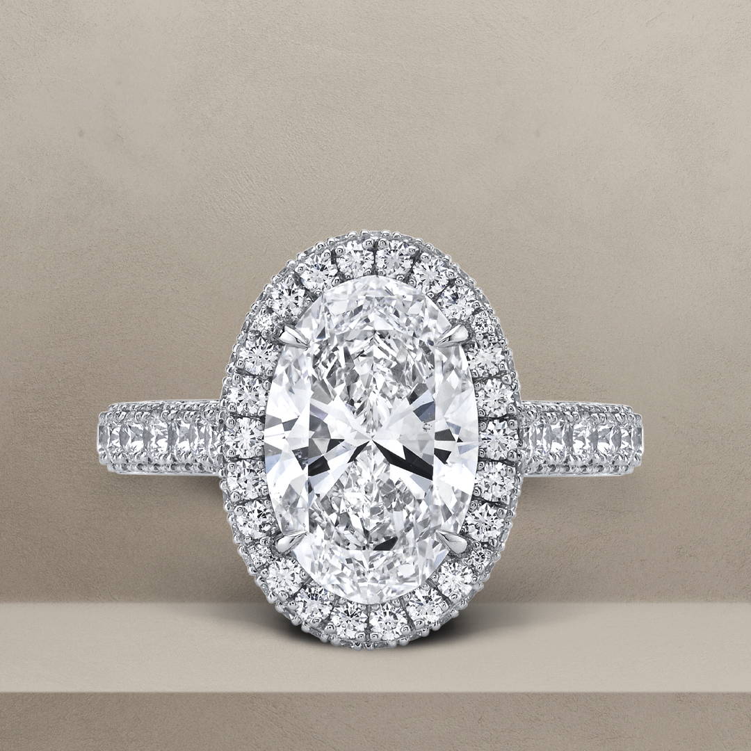 Oval shaped diamond engagement ring with diamond halo
