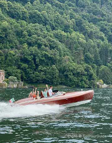Swim in the lake and relax on the boat's sundeck