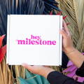 Woman holding Hey Milestone Box
