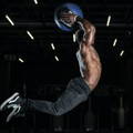 Man training with medicine ball at the gym