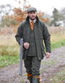 Men's game shooting attire including cap and tie.