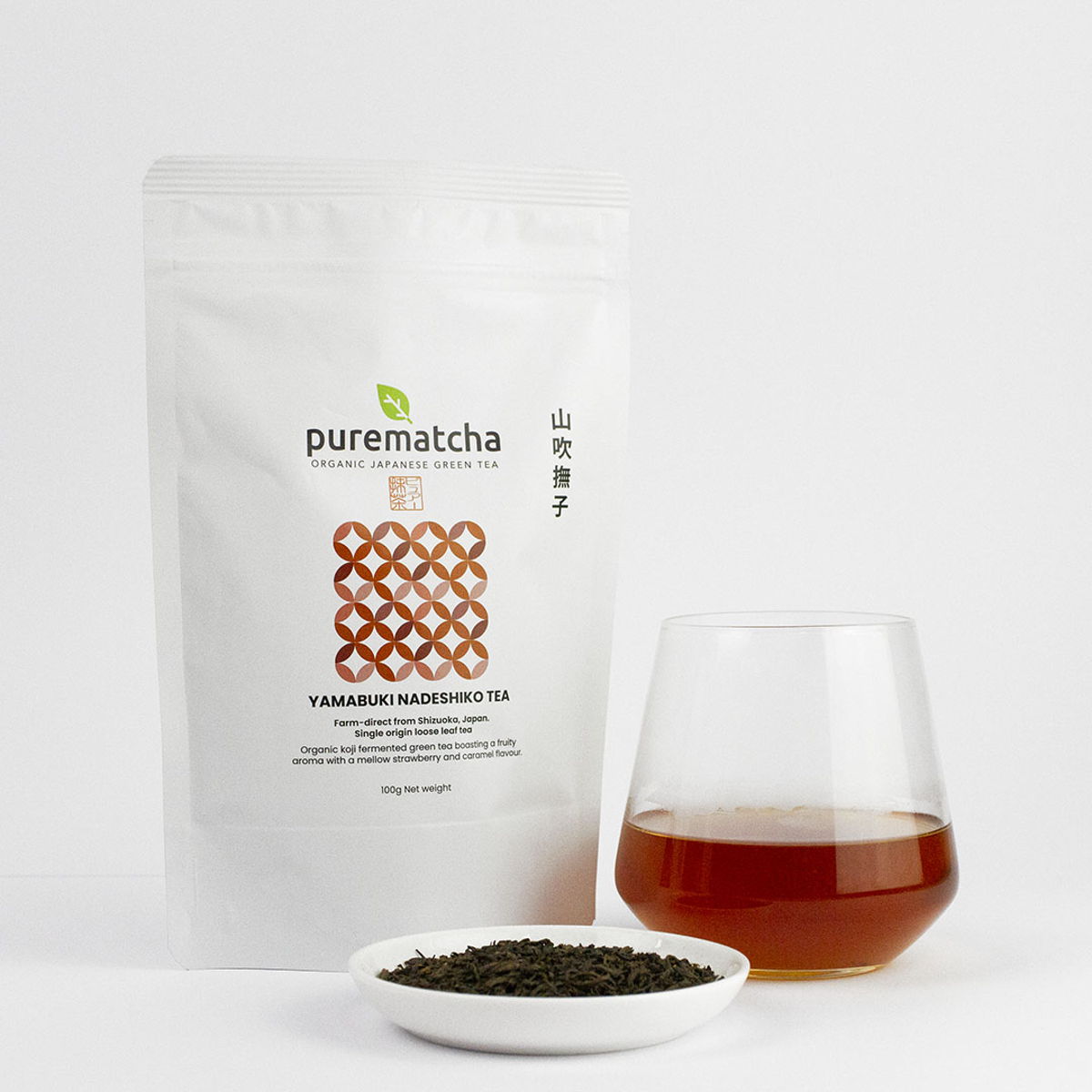 Yamabuki Nadeshiko Japanese fermented loose leaf green tea, packaging and brewed cup