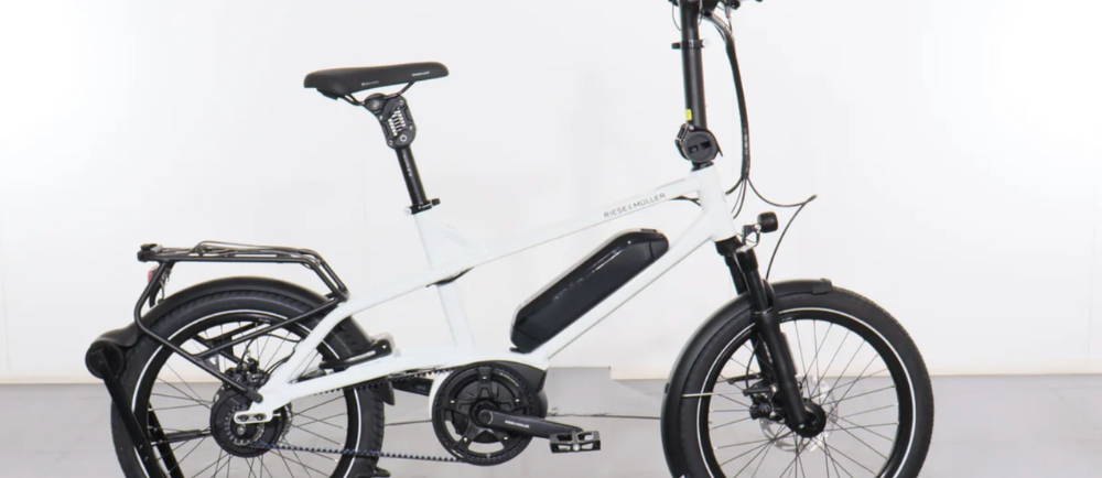 a white Riese & Müller Tinker2 Vario compact electric bike