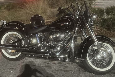 2014 HARLEY-DAVIDSON FLSTC HERITAGE SOFTAIL CLASSIC (VIVID BLACK) motorcycle for rent near Santa Rosa Beach, FL