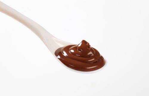 Spoon with a brown paste
