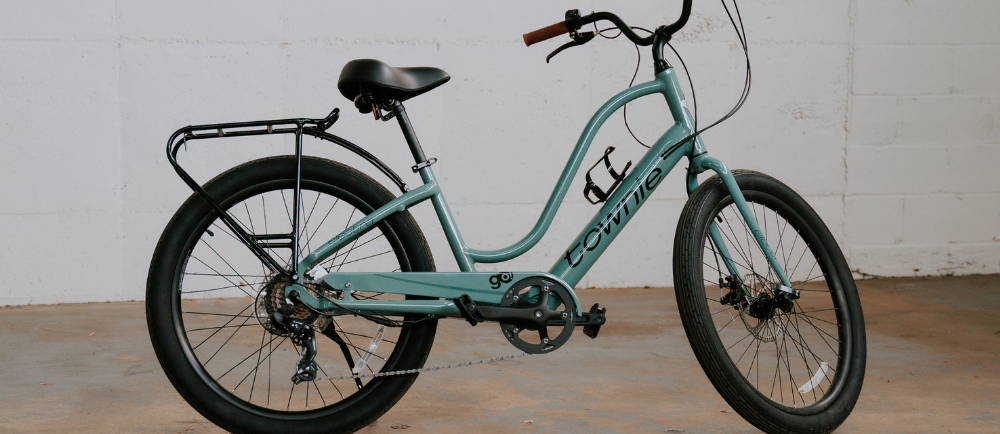 a green Electra Townie electric cruiser bike