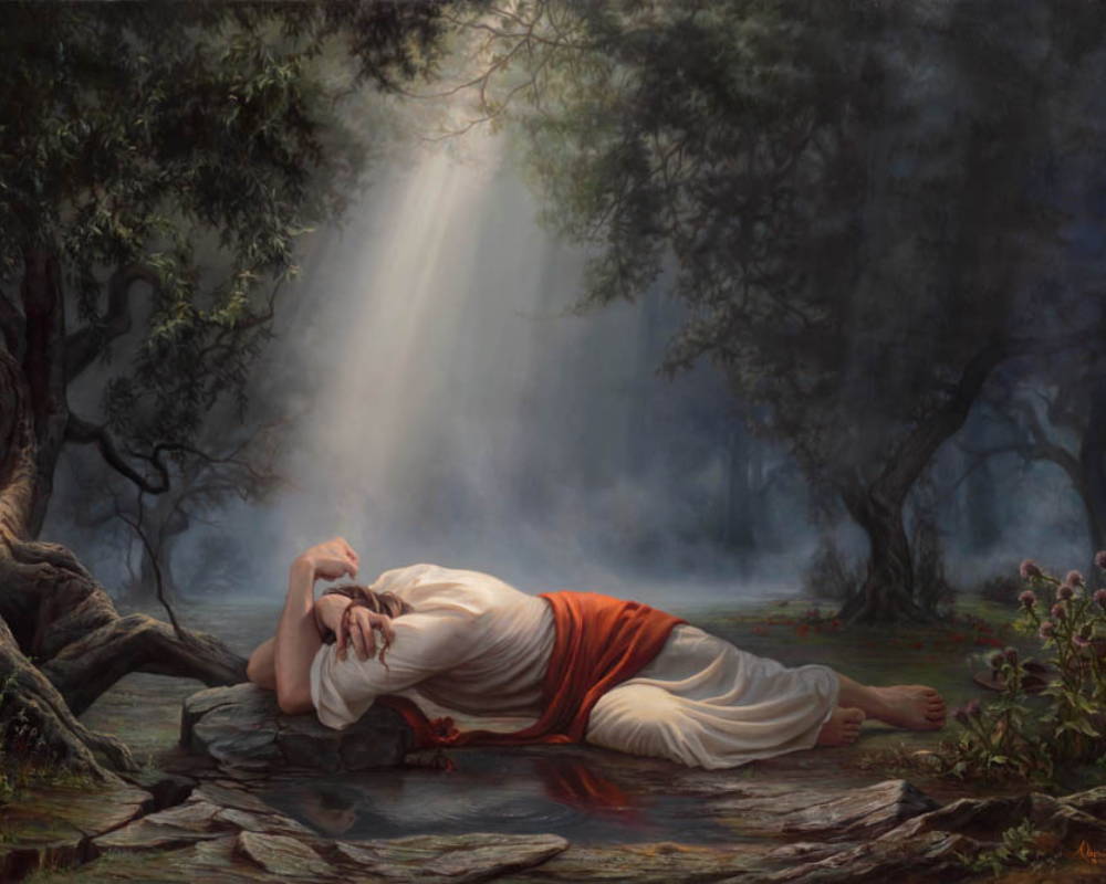 Jesus lying on the ground, suffering in the Garden of Gethsemane. Light shines down on Him. 