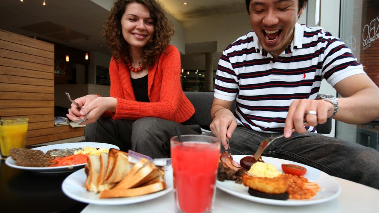 Students having a full English breakfast at a university café