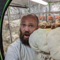 Man holding large Mushroom