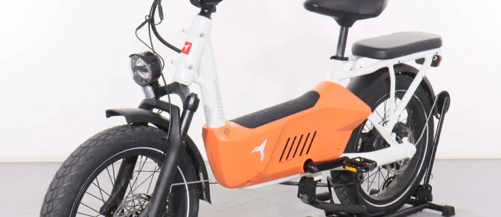 a front, side view of a Himiway C3 Cargo electric cargo bike