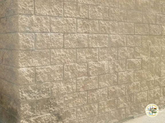 natural stone restored after being tagged with blue spray paint