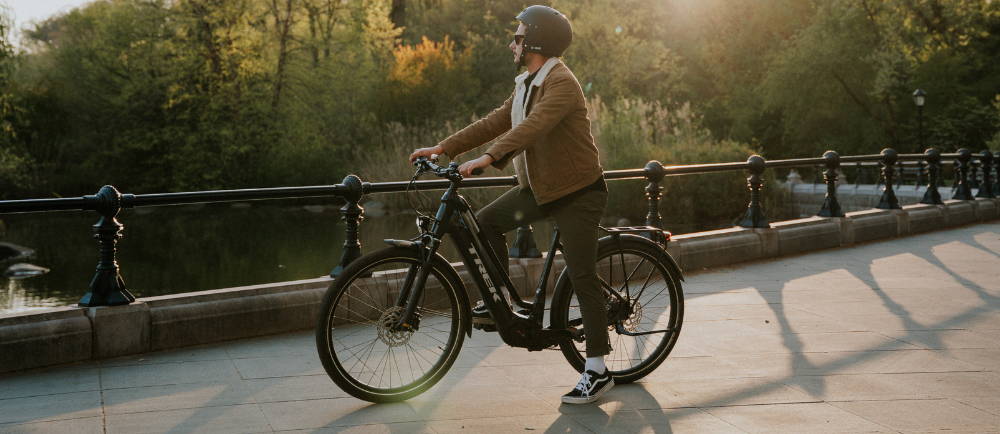 Rider on Trek Allant+ electric city bike