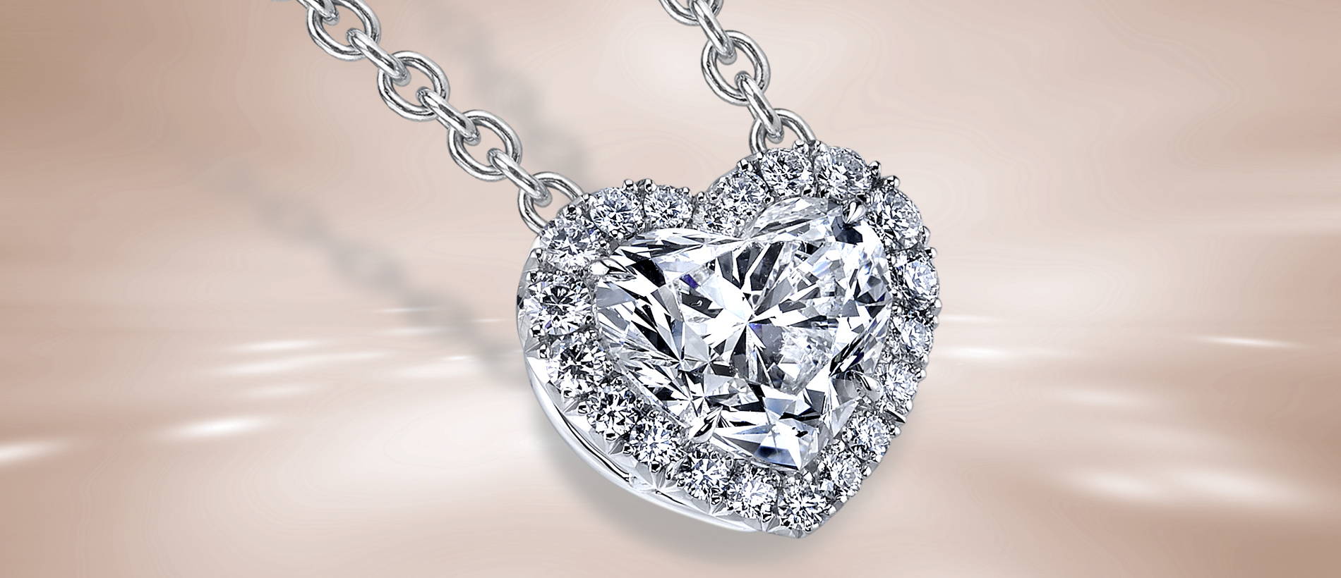 Picture of a heart shaped diamond necklace with diamond accents on a brown background