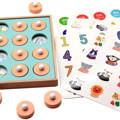 A Wooden Montessori memory matching game with cartoon animals, numbers, objects, cards and wooden pieces.
