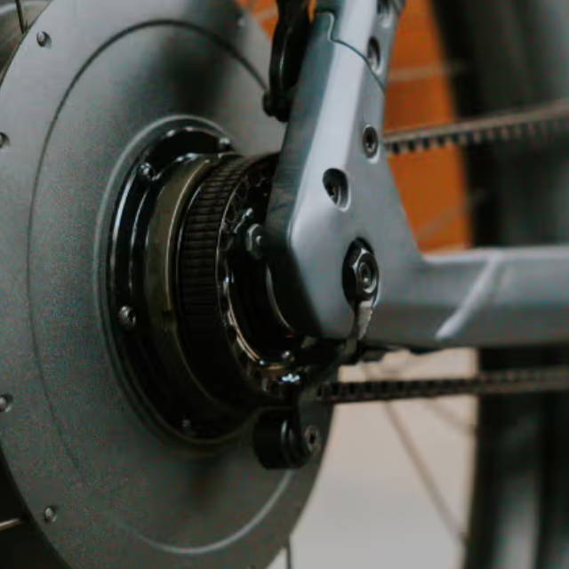a rear hub motor and belt drive on an electric city bike