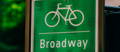 Broadway street and bicycle sign