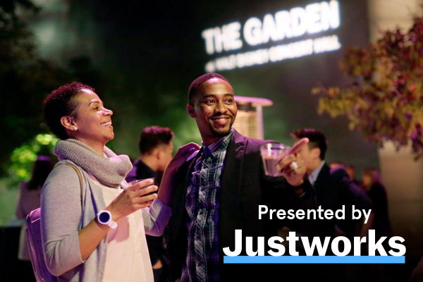 A couple enjoying Drinks in the Garden, sponsored by JustWorks