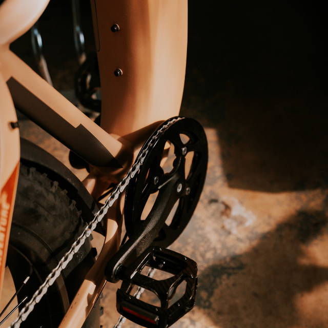 a tan Aventon Aventure fat tire electric bike