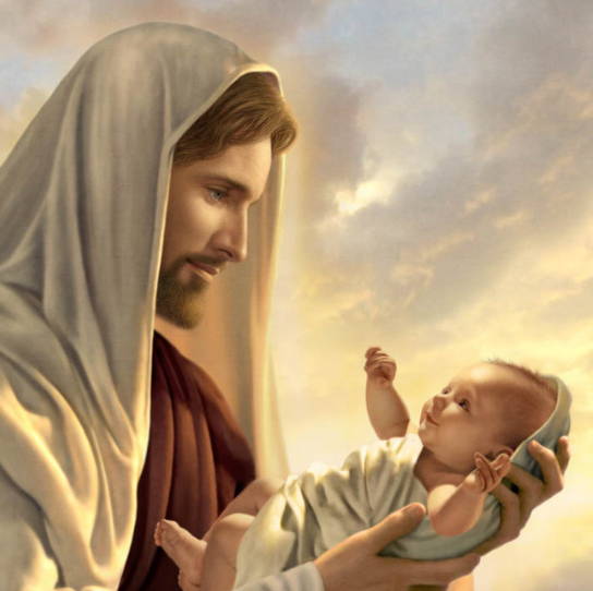 Jesus holding an infant.