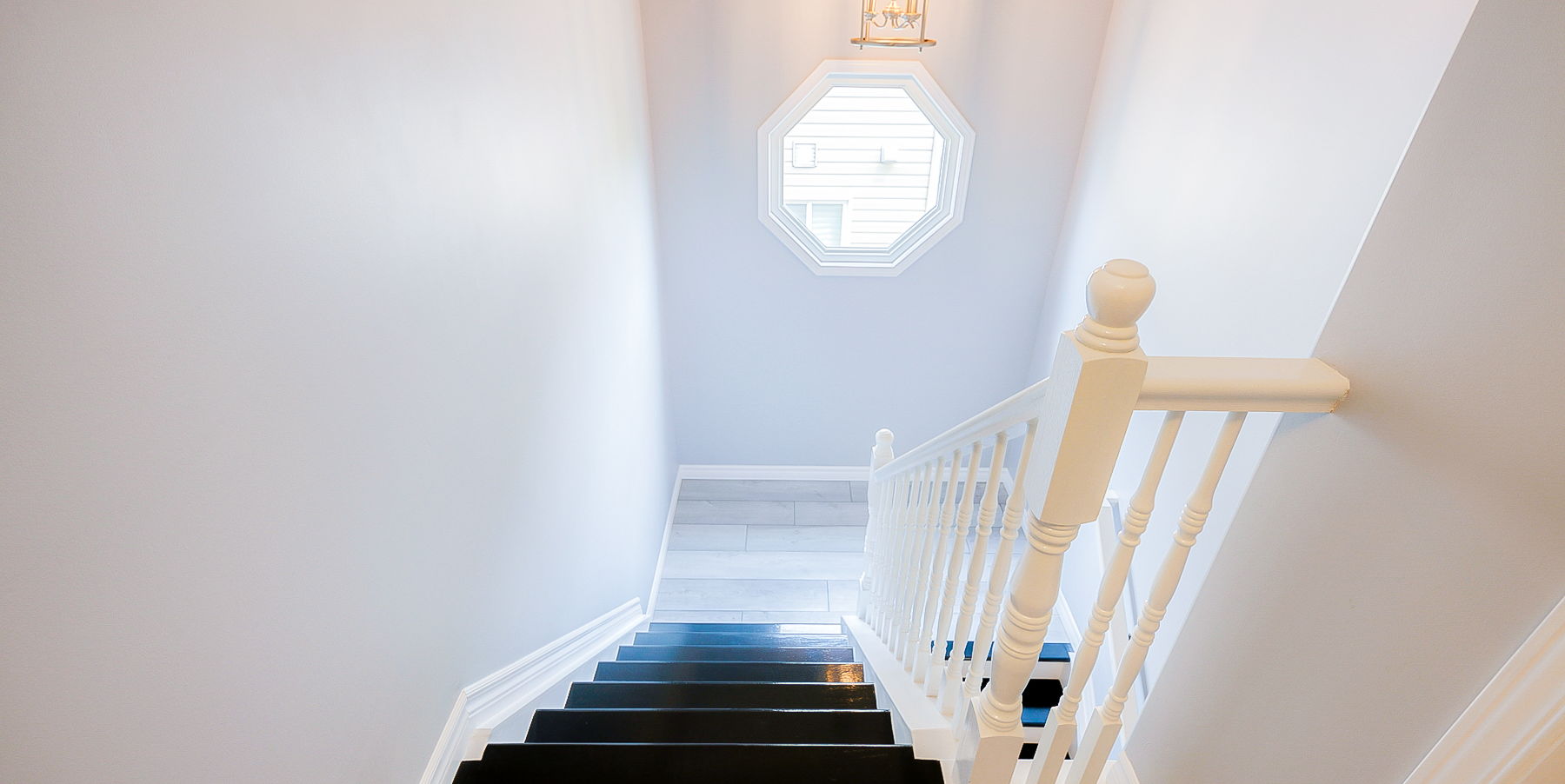 staircase with natural light