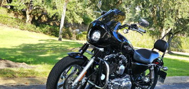 2013 HARLEY-DAVIDSON XL1200C CUSTOM (VIVID BLACK) motorcycle for rent near Orlando, FL