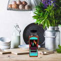 gypsy-shoals-farm-wildflower-honey-bottle-on-rustic-table
