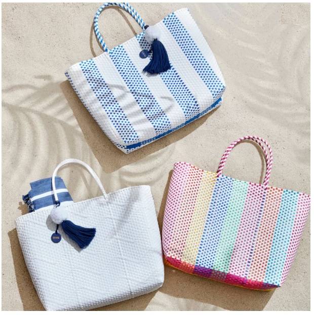 a stretchy water-resistant vibrant woven tote bag with a spacious interior and comfortable handle is the best beach gift for mom