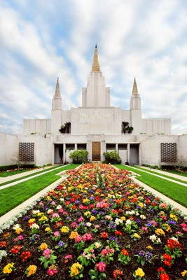 Narrow flowerbed leading up to the entrance of the Oakland temple.