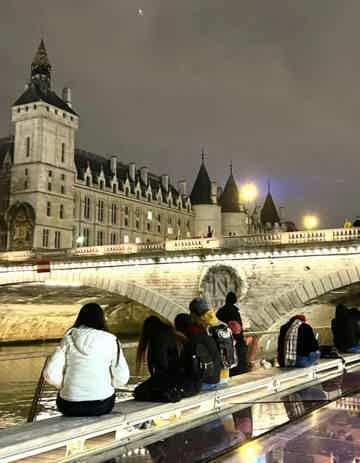 Access a curated Parisian songs playlist