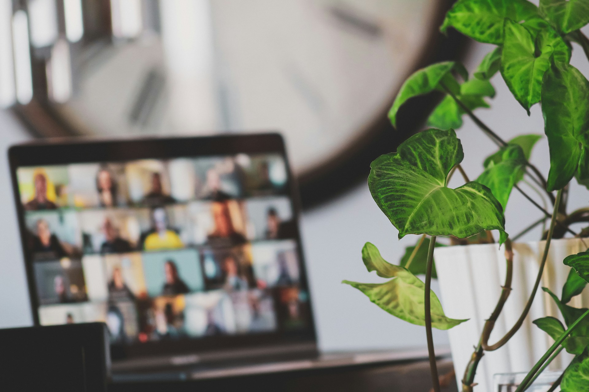 A blurry image of a computer screen with an online community in a video call