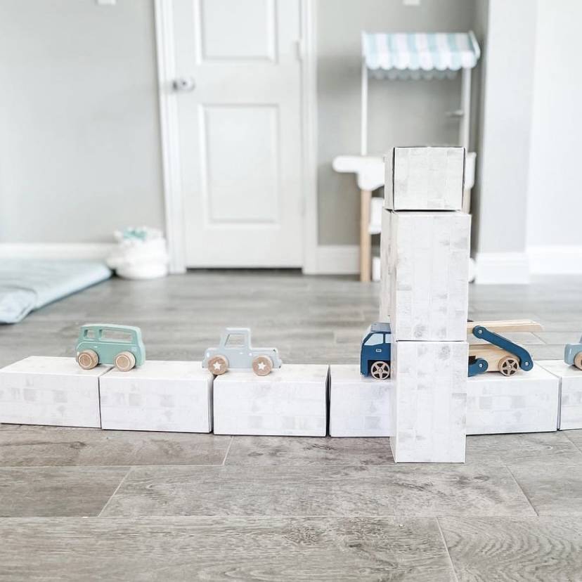 Toddler toy cars and white building blocks