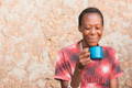 African woman drinking coffee