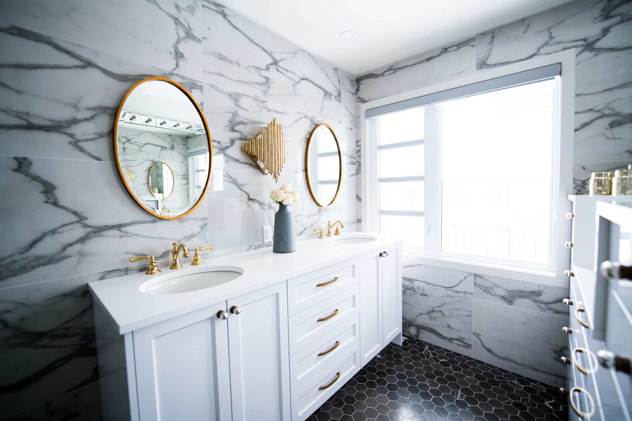 Bathroom remodel with gold accents