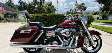 2015 HARLEY-DAVIDSON FLD103 DYNA SWITCHBACK (PEARL, SUNGLO) motorcycle for rent near Tampa, FL