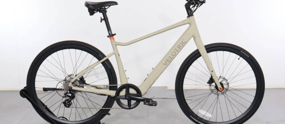 a white Velotric T1 ST electric commuter bike