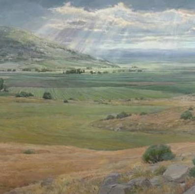 A painting of an open prairie with sun shining down through the clouds.